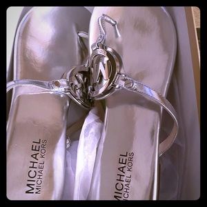 Michael kors silver thong sandals in box. New